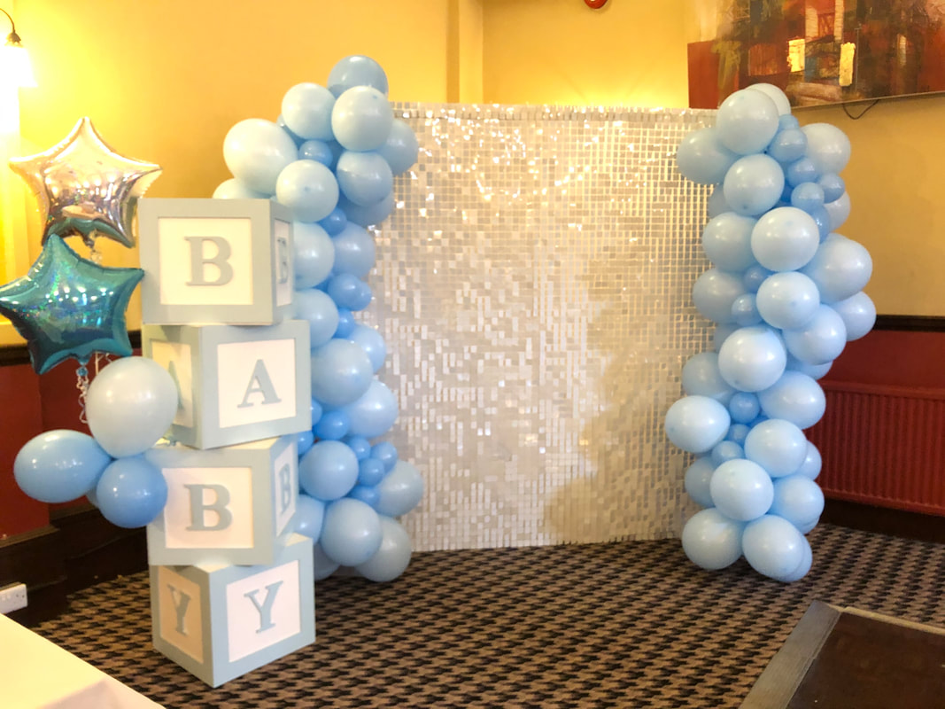 White sequin with organic balloon arch for baby shower